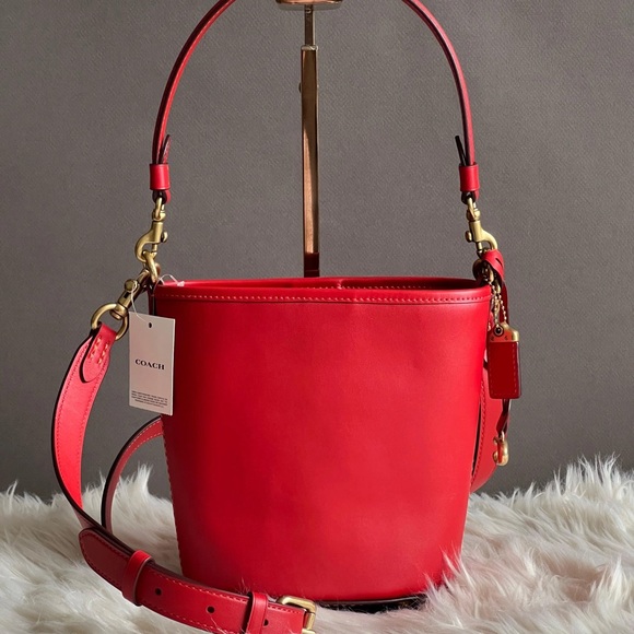 Coach Handbags - ISO Coach Dakota Bucket Bag 16 in Red